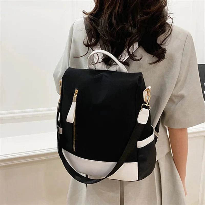 mochila anti furto senhora preta