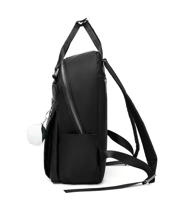 mochila mulher pompom