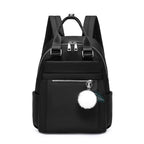 mochila com pompom preta