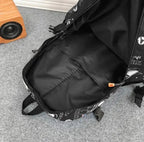 mochila de rapaz escolar astronauta